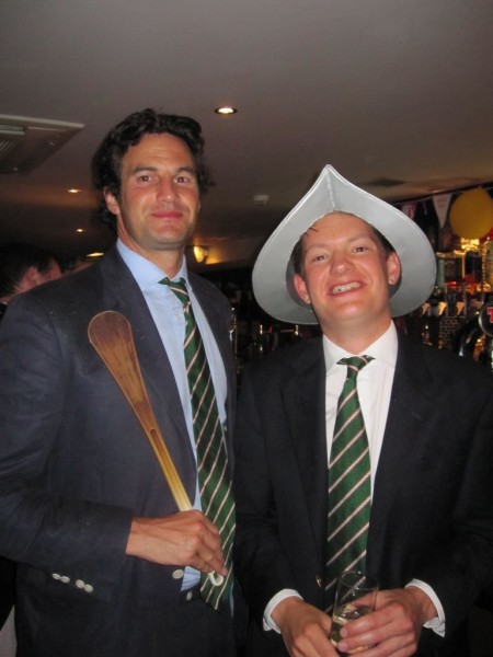 Rupert Finch shows off his award- the wooden spoon while Nick Hyde proudly wears the Conquistador helmet. 